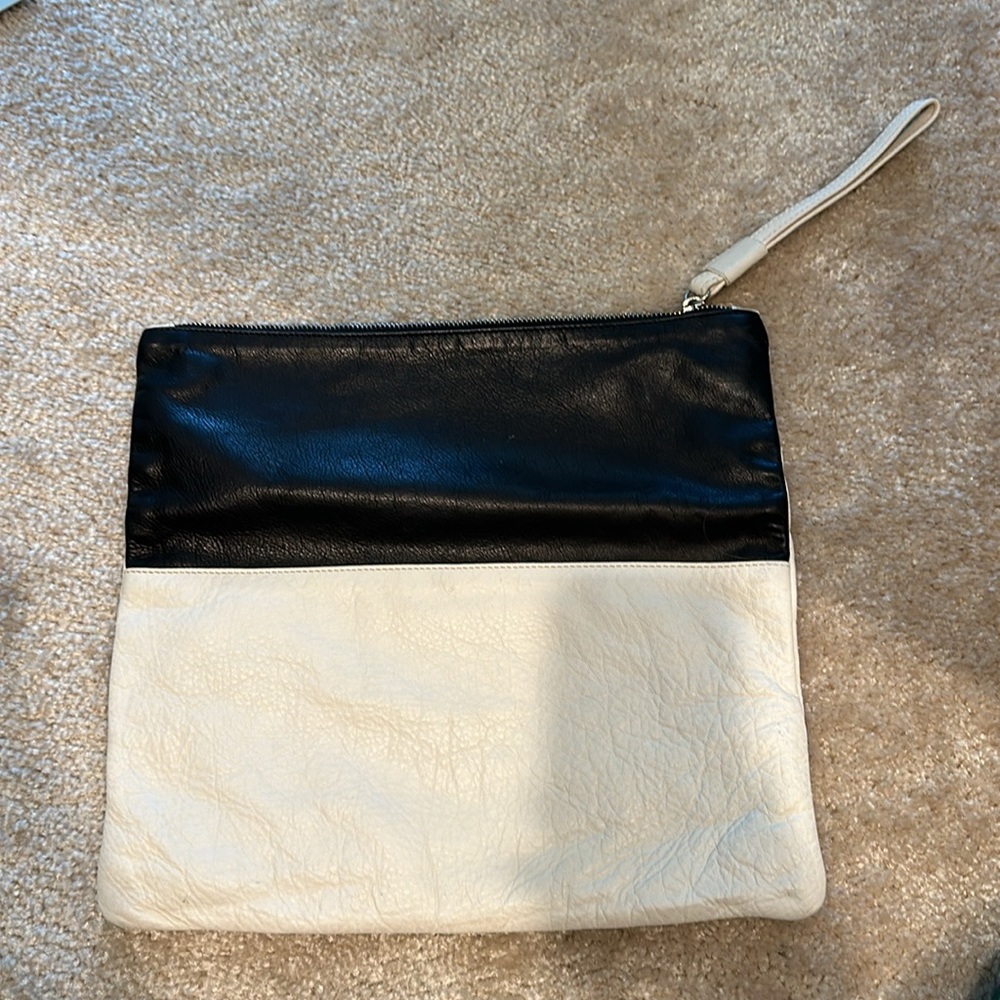 Genuine leather reversible clutch